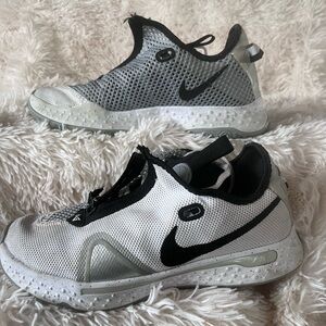 Nike PG5 athletic shoes with laces and zipper.